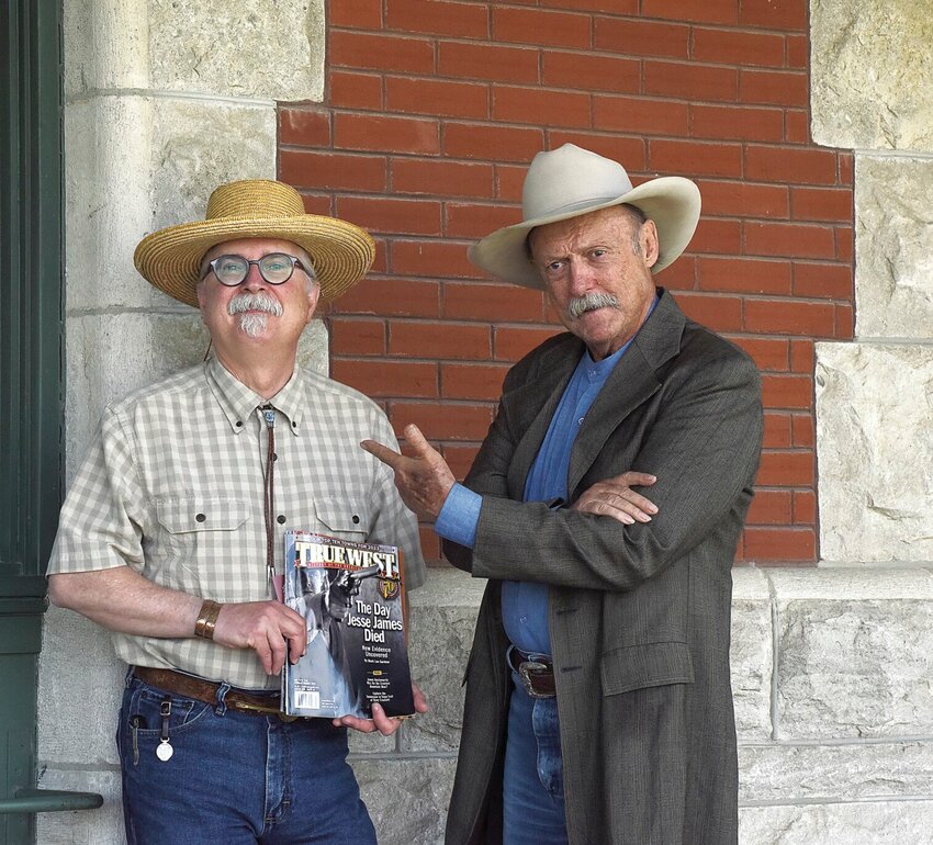 Well-known western illustrator, writer, and author Bob Boze Bell, right, and writer and author Mark Lee Gardner pose for a photo at the Katy Depot on Saturday, May 13. Bell, the executive editor and publisher of True West magazine, is researching information on Jesse James. The men stopped in Sedalia on their travels. Gardner is the nephew of Carolyn Crooker, the executive director of the Sedalia Area Convention and Visitors Bureau.   Photo by Faith Bemiss | Sedalia Democrat