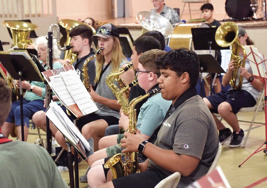 Sedalia Concert Band members rehearse Monday night, June 19 inside Convention Hall for their first performance at 7 p.m. Thursday, June 22 at Liberty Park. Band Director Sandy Greene said many members are youth from Smith-Cotton High School and other area schools.   Photo by Faith Bemiss | Sedalia Democrat