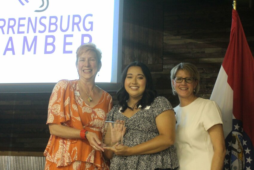 Elizabeth Hargrave is named the Chamber Member of the Year during the Warrensburg Chamber of Commerce's annual awards and social on Thursday, July 20 on the Johnson County Fairgrounds. From left, Chamber Board Chair Suzy Latare, Elizabeth Hargrave, and Chamber Executive Director Suzanne Taylor.