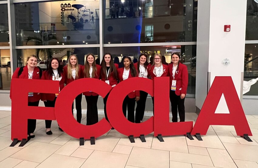 Nine students from the Knob Noster School District pose for a photo at the FCCLA National Leadership Conference in July in Denver, Colorado.