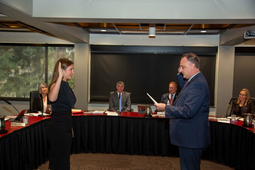 Hadley Oden, left, newly appointed student member of the University of Central Missouri Board of Governors from Hermann, was recently sworn in to her new post by 1993 UCM alumnus Brent Teichman, associate circuit judge in Johnson County.