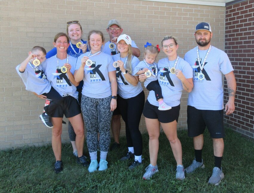 2022 Run for Freedom participants pose with their medals. The 2023 5K and 10K will be hosted Saturday, Sept. 23.