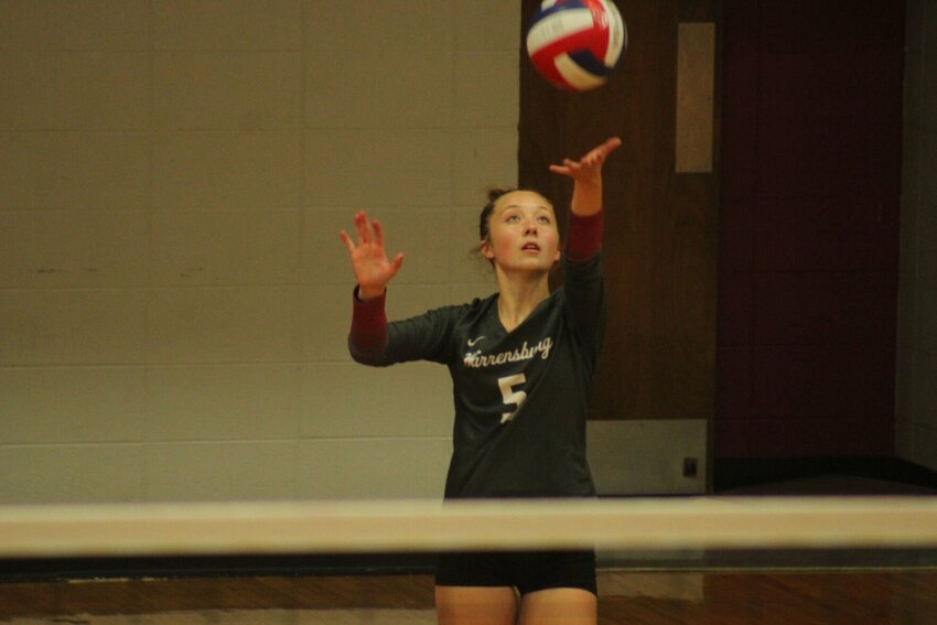 Warrensburg senior Avry Dunn serves the ball against Stover on Tuesday, Aug. 29, at Warrensburg High School.