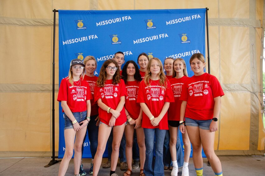 Members of the Chilhowee FFA Chapter pose for a photo during the Drive to Feed Kids at the 2023 Missouri State Fair in Sedalia.