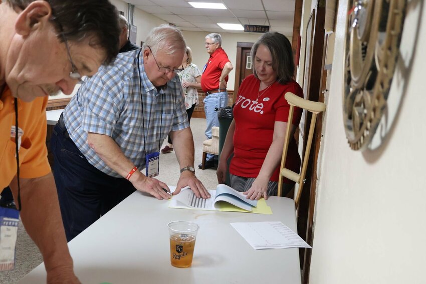 Johnson County Clerk Diane Thompson and Dale Chaney finalize paperwork for the General Municipal Election on Election Night, April 4, 2023, at the Johnson County Courthouse. Thompson's office is hosting a student design contest for the 2024 &quot;I Voted&quot; sticker.