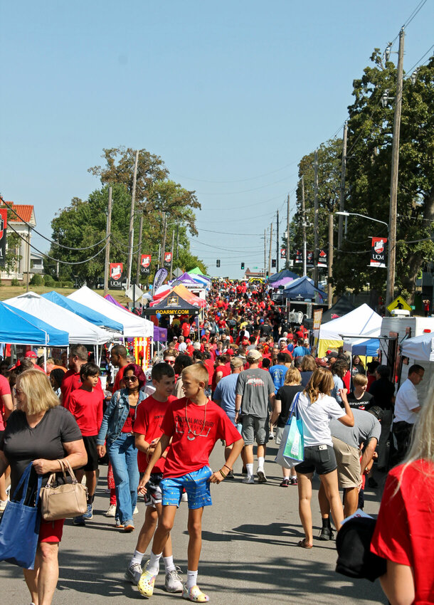 Hundreds of people fill Holden Street along the University of Central Missouri campus for the annual Get the Red Out street fair hosted Saturday, Sept. 9 by UCM and the Warrensburg Chamber of Commerce.