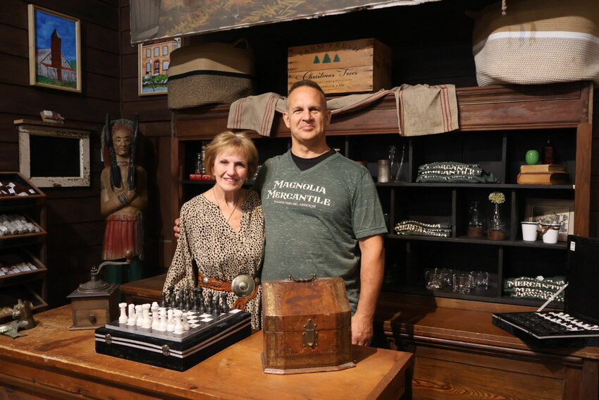 Owners of Magnolia Mercantile, Teri Smith and Lee Rhoades standing in the back of the business on Thursday, Sept. 14.