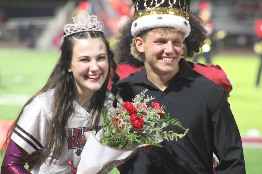 Warrensburg High School homecoming queen Maggie Stuck and king Colby Hennrich pose for a photo Friday, Sept. 29, at the Warrensburg Activities Complex.