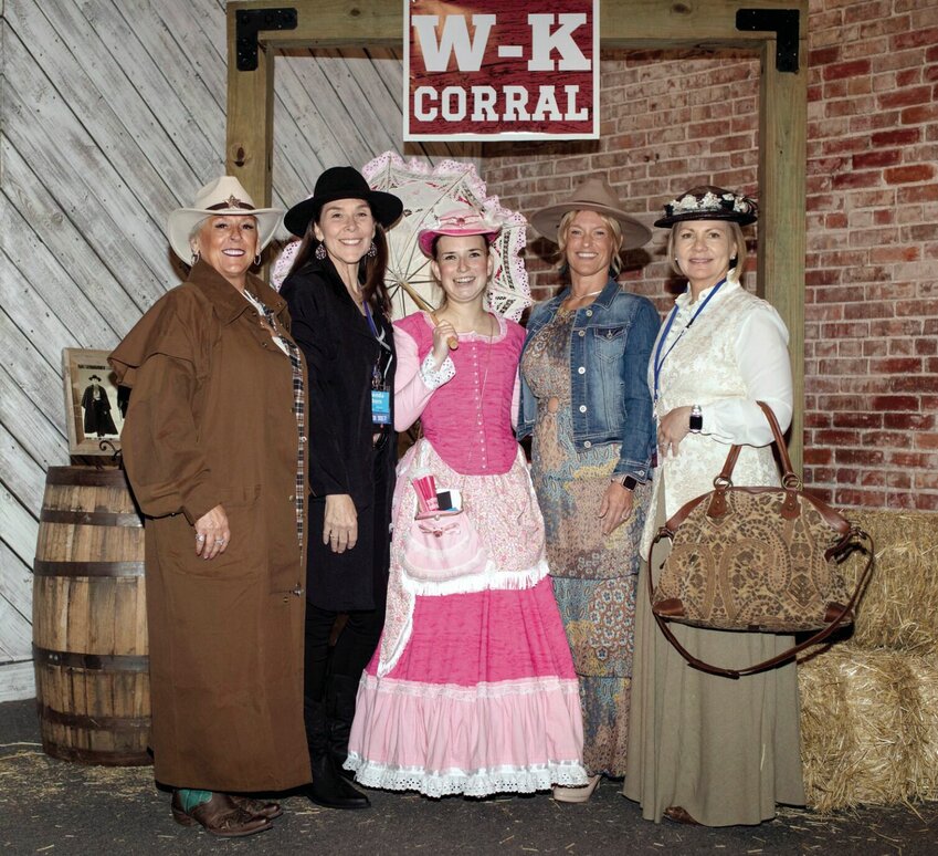 Realtors with the West Central Association of Realtors pose for photos during Casino Night. The theme of the evening was &ldquo;Tombstone&rdquo; and many guests dressed up for the occasion.