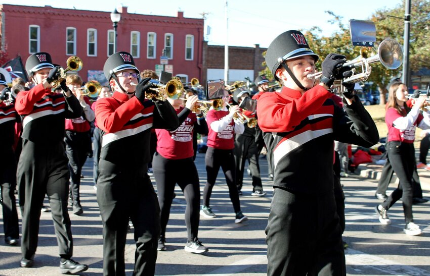 The Warrensburg High School marching band makes its way down Holden Street during the University of Central Missouri Homecoming parade Saturday morning, Oct. 21 in downtown Warrensburg.