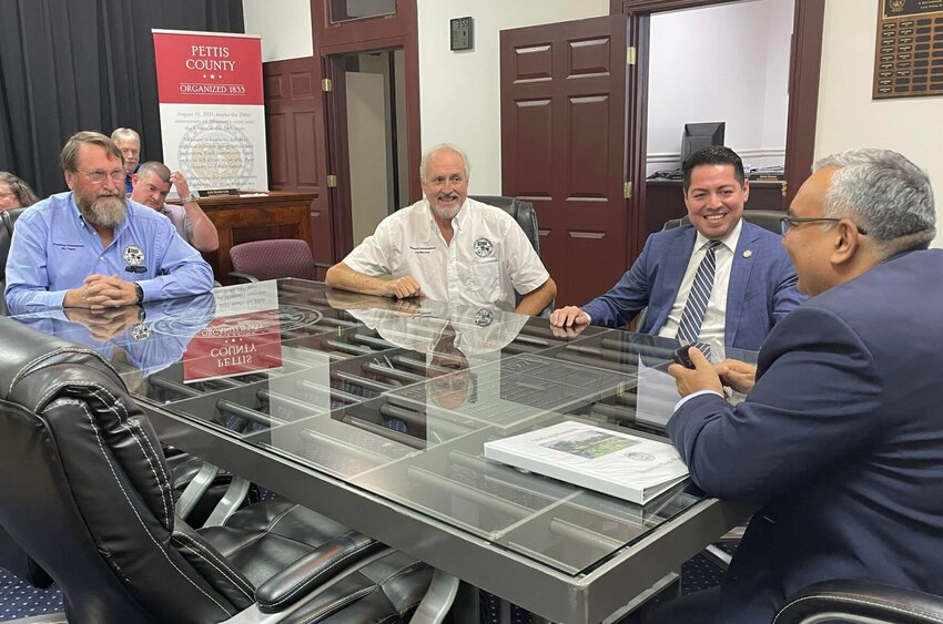 From left, Pettis County Commissioners Bill Taylor, Jim Marcum and Israel Baeza meet with Missouri State Treasurer Vivek Malek on Monday, Oct. 30 in their chambers to discuss the MOBUCK$ program. Earlier in the day, Malek visited the Johnson County Courthouse.