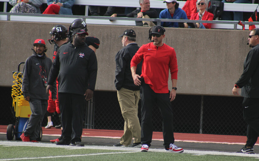 Central Missouri head coach Josh Lamberson communicates from the sideline against Fort Hays State on Nov. 4, at Walton Stadium.