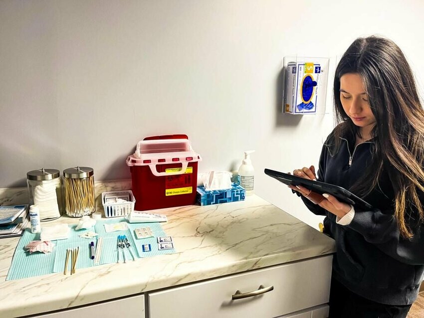 On Monday, Nov. 27, a U.S. Dermatology Partners staff member prepares for the new location's first day of operation. The Warrensburg office opened Monday.