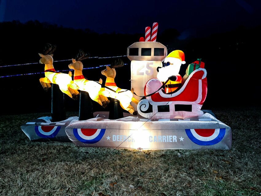 A blowup of Santa Claus and his reindeer on a sled is part of the new holiday light display at Lion's Lake, hosted by Warrensburg Parks and Recreation. The lights at the holiday display turn on at 5:30 p.m. every day.