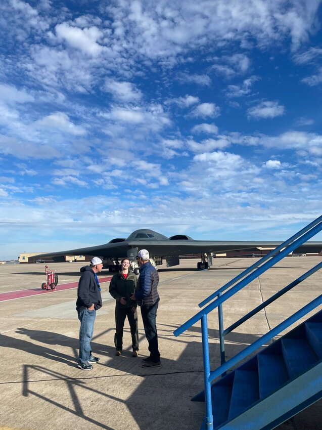 Capt. Janell Campbell, 13th Bomb Squadron B-2 pilot, speaks with attendees after flying the the stealth bomber on Friday, Dec. 16, at Whiteman Air Force Base.