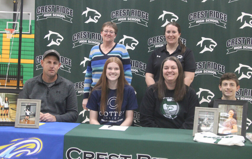 Mady Trobough signed her letter of intent to play volleyball at Cottey College on Tuesday, Dec. 19, at Crest Ridge High School.
