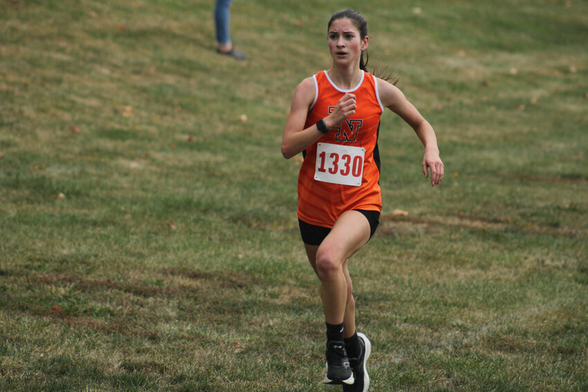 Knob Noster sophomore Lyla Stiles completes the final stretch of the MRVC conference meet on Oct 18, at Southview Park in Richmond.