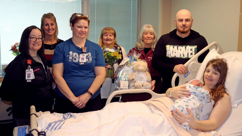 The first baby born in the New Year at Western Missouri Medical Center was a boy born Monday, Jan. 1. Nikolay Junior weighed 8 pounds, 7 ounces and was 19 inches long. In honor of the first baby of 2024, the WMMC Auxiliary presented Nikolay&rsquo;s parents with a gift basket from the Wishing Well Gift Shop and a floral arrangement from Awesome Blossoms.   Photo courtesy of Western Missouri Medical Center
