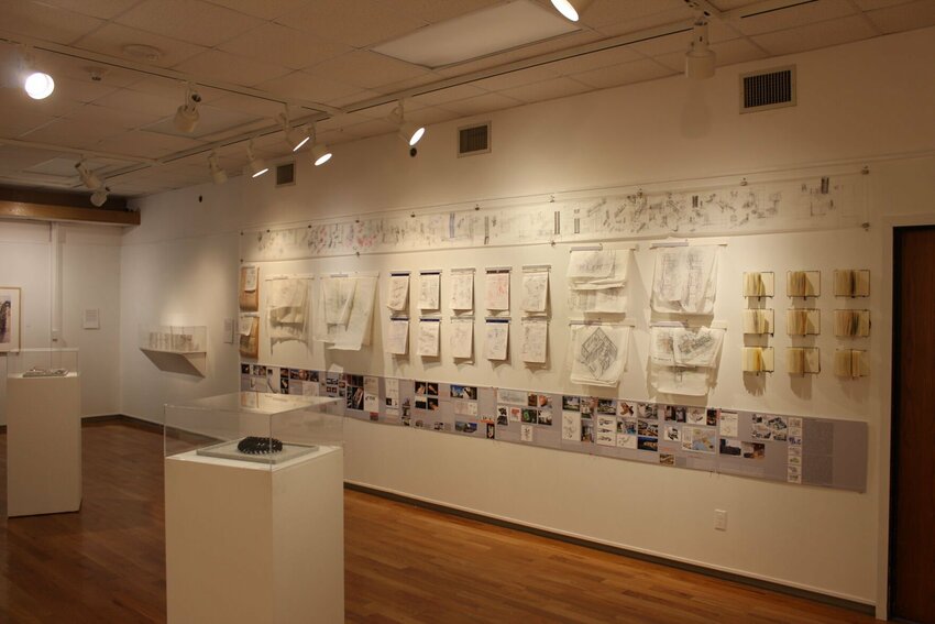 Design sketches and workbooks line the gallery walls at the &quot;Empowered by Design&quot; exhibition on Wednesday, Jan. 17, in at the University of Central Missouri Art Center Gallery.&nbsp;