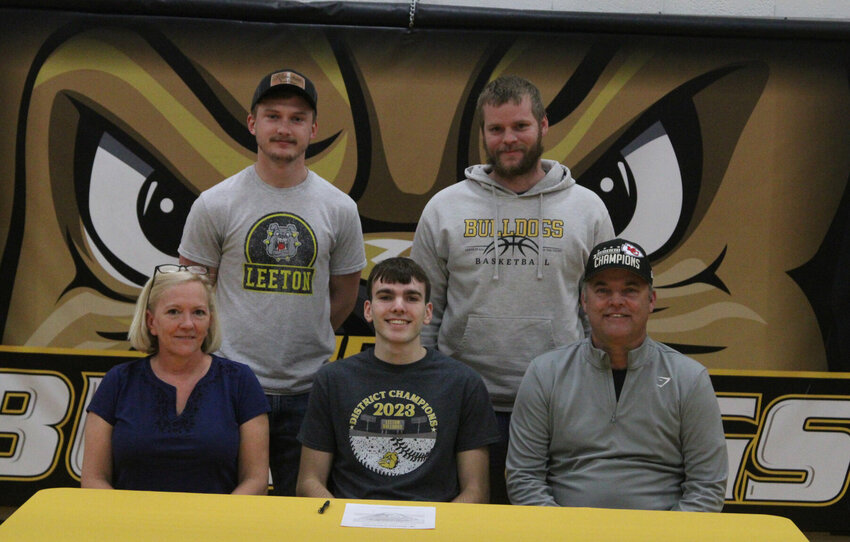 Leeton senior Camden Uptegrove signed his letter of intent to play basketball at Mission University in Springfield on Monday, Feb. 12, at Leeton High School.&nbsp;