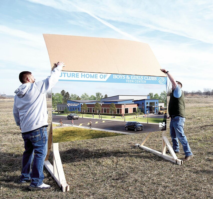 On Wednesday, Feb. 21, Jake Gieschen, left, and RJ Lindstrom unveil the plans for the new 30,000-square-foot Teen Center for the Boys &amp;amp; Girls Clubs of West Central Missouri, to be located on East Third Street in Sedalia. Gieschen and Lindstrom are the co-chairs of the BGC Capital Campaign, which has already raised $4.2 million for the facility.   Photo by Faith Bemiss-McKinney | Sedalia Democrat