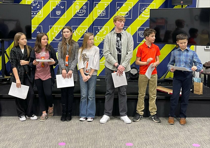 Warrensburg-North participants included, from, Charlotte Carter, Christianna Vaughn, Eleanor Lefebvre, Emma Morton, Graysen Johnson, Shawn Peterson, Andrew Diaz. Not pictured is Avery Rivera.   Photo courtesy of Classical Conversations