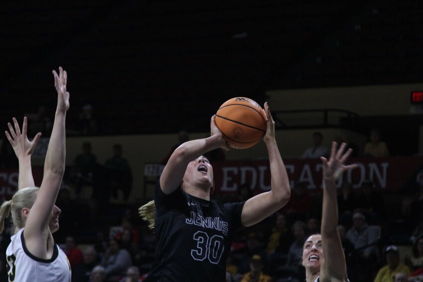 Central Missouri redshirt senior Brooke Littrell posts a shot against Fort Hays State in the MIAA Championships quarterfinal round Friday, March 8, at the Municipal Auditorium in Kansas City, Missouri.