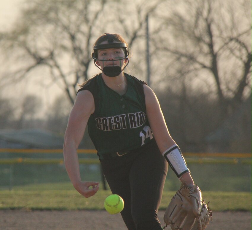 Crest Ridge sophomore Jenna Shelton winds a pitch against Green Ridge on Thursday, March 21, in Green Ridge.
