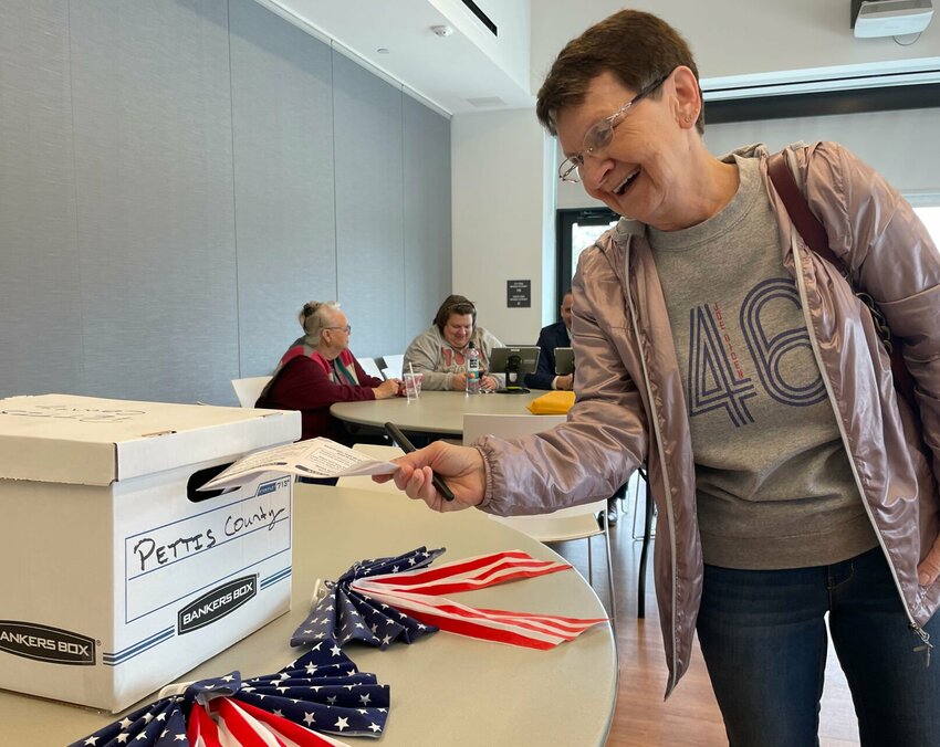 Sandra Self votes at the Democratic presidential primary Saturday, March 23 at the Heckart Community Center in Sedalia. Employees of the Pettis County Clerk's Office were on hand to help with the voting process.   Photo by Chris Howell | Sedalia Democrat
