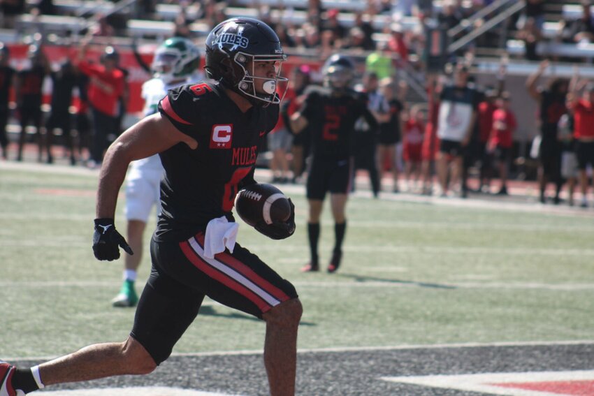 Central Missouri redshirt senior wide receiver Arkell Smith trots into the end zone for a touchdown against Northwest Missouri on Sept. 30, 2023, at Walton Stadium.