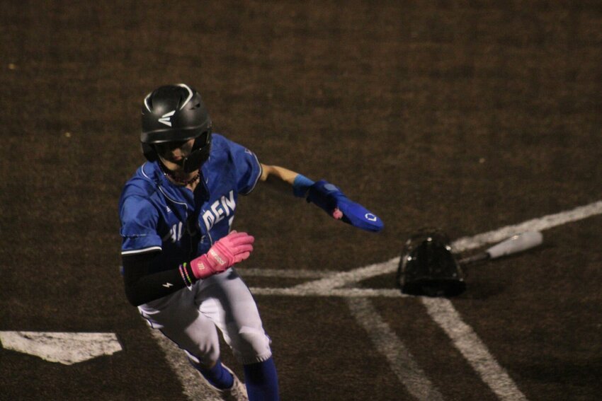 Holden junior Trace Angell rounds home plate against Knob Noster on Friday, April 12, at Holden High School.