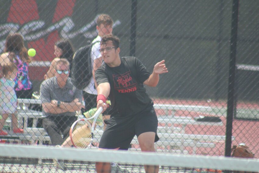 Warrensburg sophomore Calvin Werner chases a ball during the MRVC Tournament on Wednesday, May 1, at the Warrensburg Activities Complex.