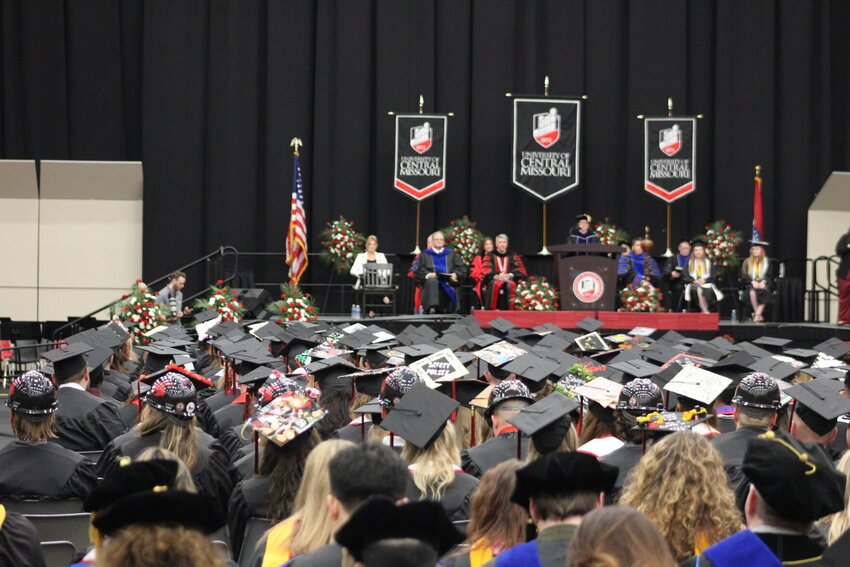 A sea of caps and gowns line the floor at the 2 p.m. commencement ceremony, as students wait to become alumni of the University of Central Missouri on Saturday, May 4, at the Jerry M. Hughes Athletics Center. Graduate students were recognized during a commencement ceremony Friday evening, May 3, and a total of three undergraduate ceremonies took place Saturday.