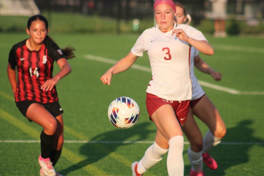 Warrensburg senior Myla laws dribbles the ball against Carl Junction in the Class 3 District 7 semifinal round Thursday, May 14, at Paragon Star in Lee’s Summit.