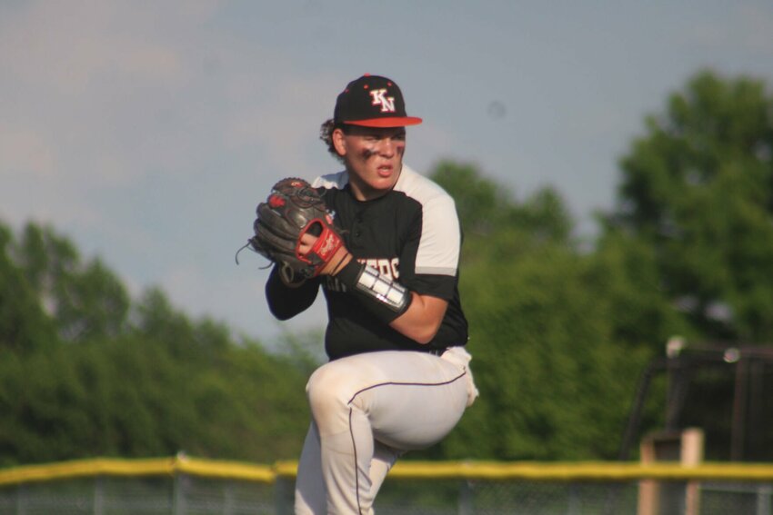 Knob Noster senior Trey Payne throws a pitch agaisnt Nevada on Thursday, May 16, at the Pleasant Hill Recreation Complex.