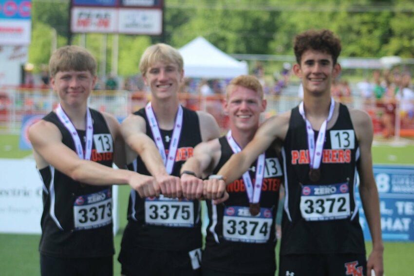 Knob Noster 4x800 meter relay members Eli Vaughan, Levi Wilhelm, Noah Wallace and Micah Rivera pose for a photo after finishing eighth in the MSHSAA Class 3 Championships on Friday, May 17, at Adkins Stadium.