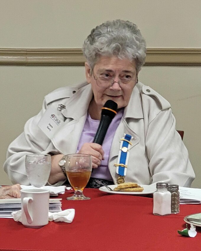Warrensburg DAR member Jayne Barry shares memories of her time serving in the Navy during the May 10 DAR meeting.   Photo courtesy of the Warrensburg chapter of DAR