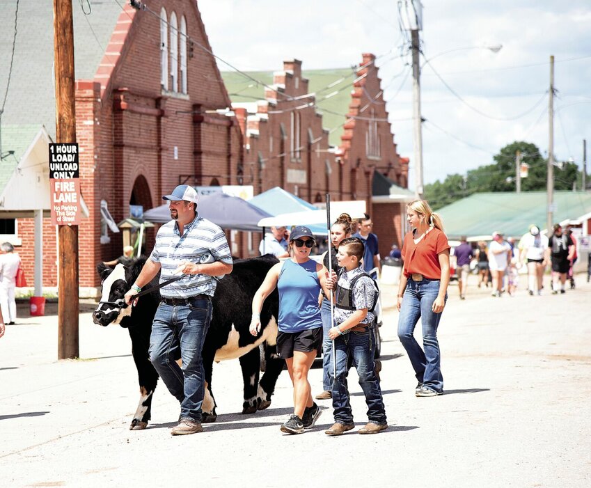 During the 2023 Missouri State Fair, a farm family exits the MSF Coliseum with their steer after competing in one of two beef cattle shows. The 2024 MSF will run from Aug. 8 through Aug. 18.&emsp;File Photo by Faith Bemiss-McKinney