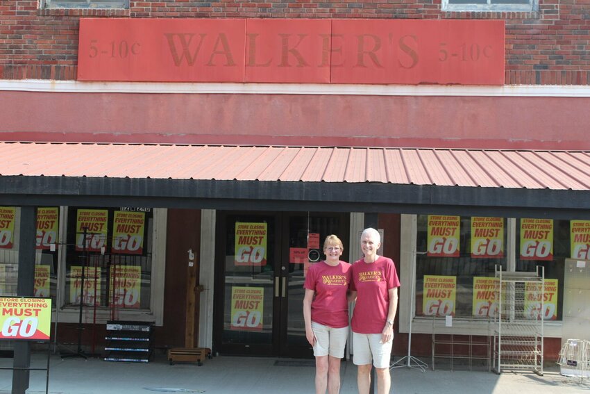 Scott and Paula Walker stand outside their store on Friday, July 26, at Walker’s 5 & 10 Variety in Holden. After 34 years, Walker's is closing its business on August 3rd. 