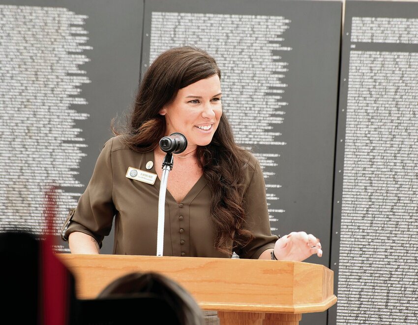 Dr. Brittany Walter, a forensic anthropologist with the Defense POW/MIA Accounting Agency at Offutt Airforce Base in Nebraska, speaks on Sunday, Aug. 18, at the Missouri Veterans Home in Warrensburg. Walter was the guest speaker for the Vietnam Traveling Wall Welcoming Ceremony.   Photo by Faith Bemiss-McKinney | Democrat