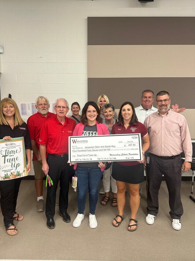 Warrensburg Schools Foundation Board members awarded the Time for a Tune Up! grant to Jacquelyn Starr and Sarah Ray on Friday, Aug. 23. 