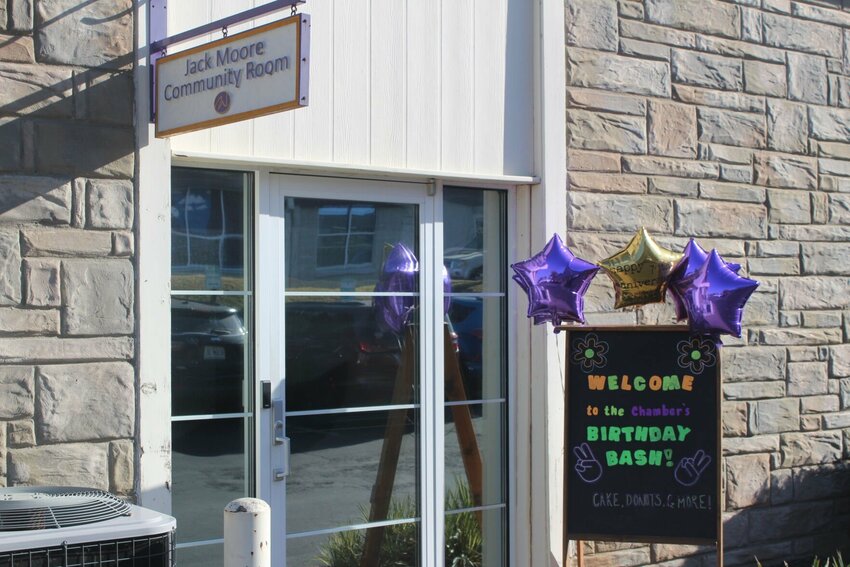 Warrensburg Chamber of Commerce staff, board members and community partners gather for the celebration on Tuesday, Sept. 17, in the Jack Moore Community Room.