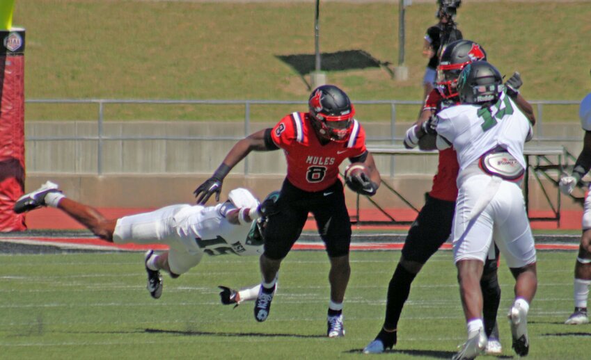 Central Missouri junior running back Marcellous Hawkins breaks away for a touchdown against Northeastern State on Saturday, Sept. 7, at Walton Stadium.