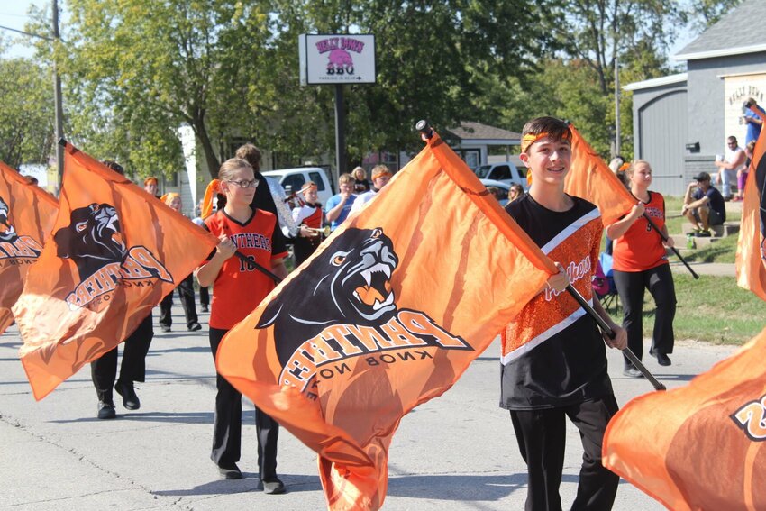 The Knob Noster High School Color Guard help lead the 2024 Homecoming Parade on Friday, Oct. 4.