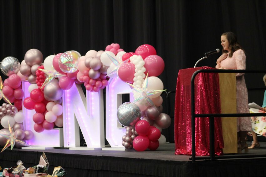 Guest speaker Ashley Walls speaks on her experience of being diagnosed with breast cancer at the age of 29 at the Ladies' Night Out event by the Western Missouri Medical Center on Tuesday, Oct. 8, at the Jerry M. Hughes Athletics Center. 