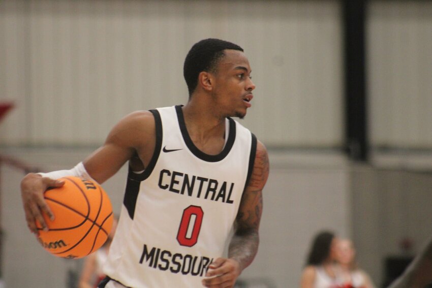 Central Missouri senior DeAirius Barker drives the ball against Maryville on Nov. 13, at the Jerry M. Hughes Athletics Center.