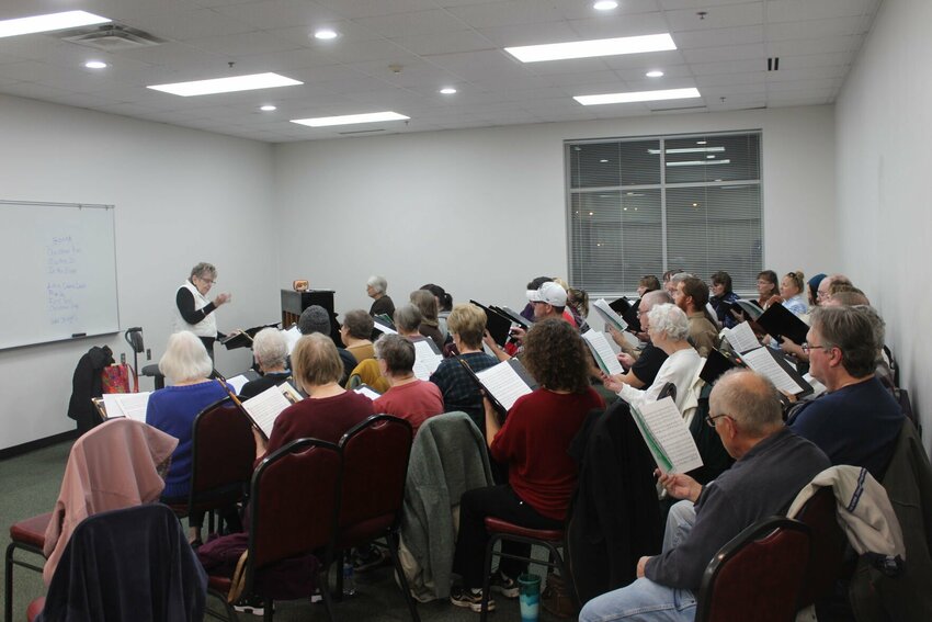 The Warrensburg Community Chorus rehearses its holiday songs ahead of its upcoming concert on Tuesday, Nov. 26, at the Warrensburg Community Center. The chorus will present &ldquo;A Christmas Gift of Song,&rdquo; at 3 p.m. on Sunday, Nov. 15, at the ​​Warrensburg Community of Christ Church.