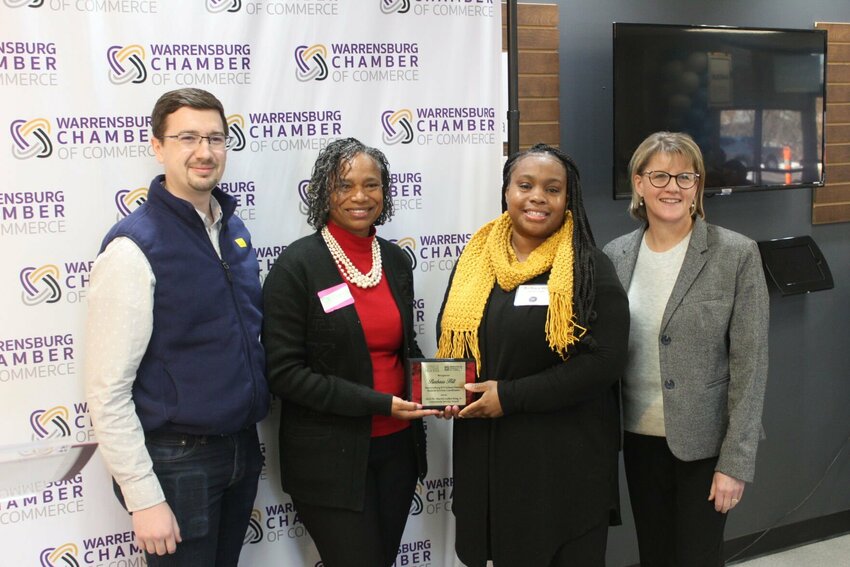 From left, Warrensburg Chamber Chairman Max Ridenhour, UCM Center for Multiculturalism and Inclusivity Director Dr. Lover Chancler, 2025 Dr. Martin Luther King Jr. Community Service Award Winner Barbara Hill and Chamber Executive Director Suzanne Taylor pose for a photo on Wednesday, Jan. 15, at the Northside Christian Church in Warrensburg.