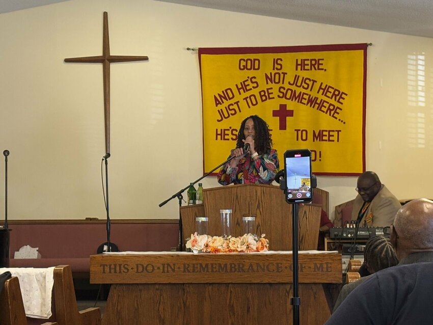 Guest speaker Pastor Camille Bess of Mt. Zion Apostolic Temple speaks to those in attendance of the 39th Annual Black History Month Celebration about belief and labor on Sunday, Feb. 23, at the Jesus Saves Pentecostal Church in Warrensburg.