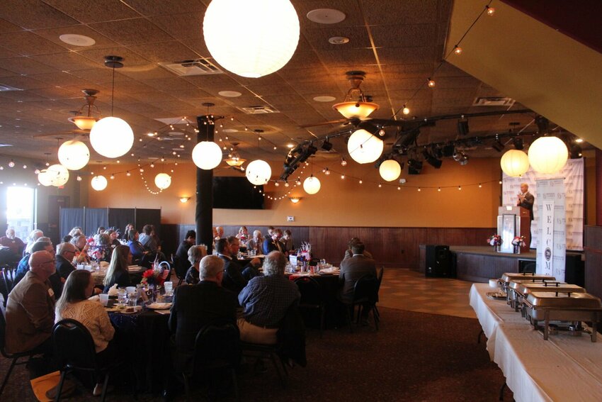 Johnson County and Warrensburg city officials look to the stage and listen to District 31 State Senator Rick Brattin during his speech at the Legislative Luncheon on Friday, March 7, at the PLAYERS Restaurant. The luncheon was hosted by the Warrensburg Chamber of Commerce.&nbsp;